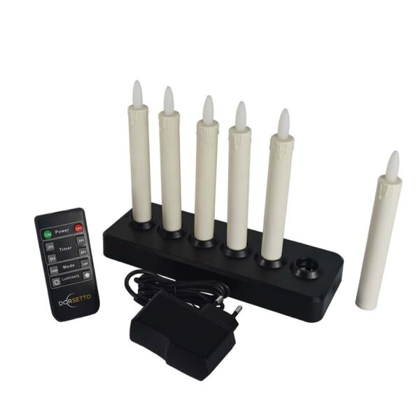 De set bevat zes oplaadbare 150 mm warmwitte LED dinerkaarsen (58 uur), geplaatst in een zwarte oplaadbasis, compleet met een afstandsbediening en een zwarte voedingsadapter.